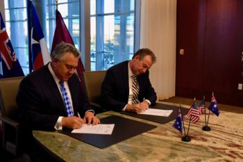 (Right) Dr. Patrick Stover, AgriLife Research director, and Australia Ambassador Joe Hockey signed the agreement at the AgriLife Center on the Texas A&M University campus in College Station Jan. 23.