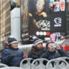 From left, Neal Elementary Students Vicente Rosas, Cristofer Garcia and Alex Berman, a Texas A&M student who was one of the several university and Neal Elementary personnel who accompanied the students on the trip, enjoy a ride atop a double-decker bus in Manhattan.