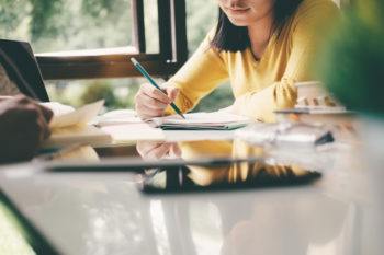 Woman studying at a table