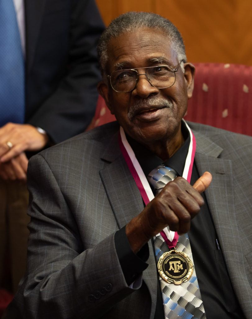 Leroy Sterling smiles after being presented with the Pioneer Medal.