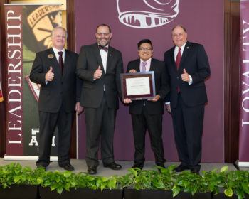 Trujillo receives a 2019 Buck Weirus Award.