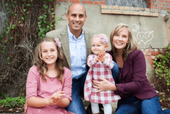 Voelkel pictured with his wife and two daughters.