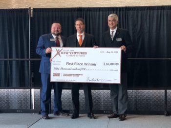 From left: Chris Scotti, chair of the Texas A&M New Ventures Competition, Daniel Powell and Balakrishna Haridas.