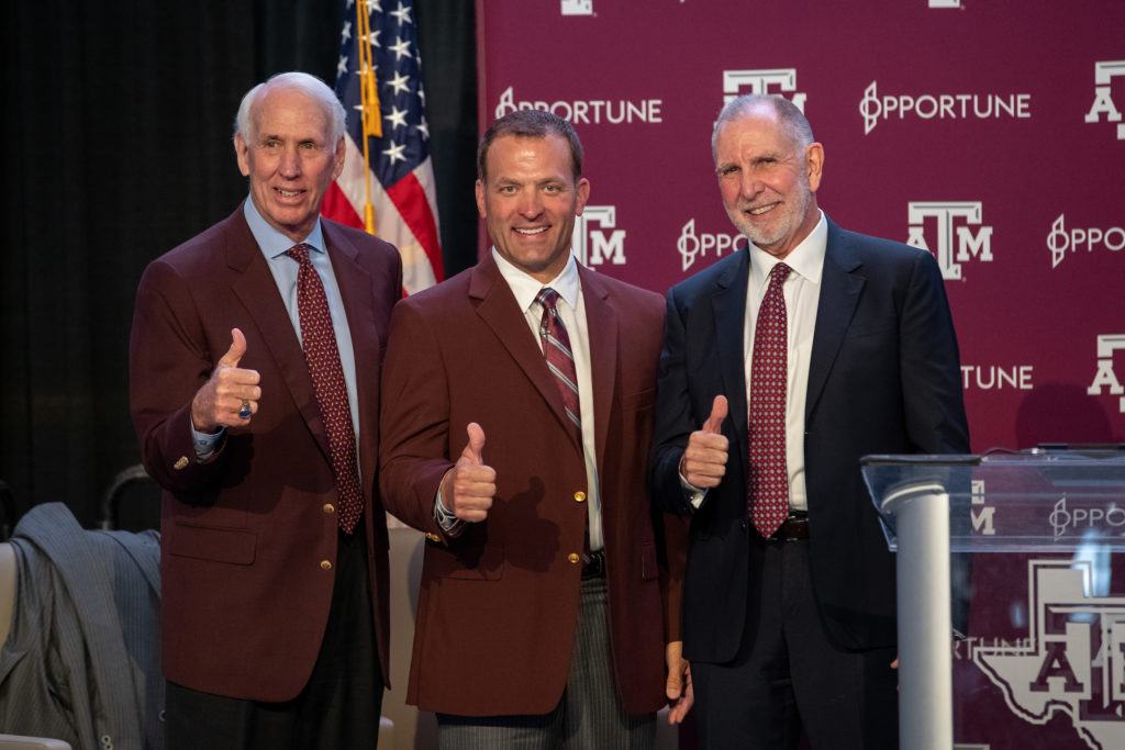 Interim Director of Athletics R.C. Slocum, incoming Director of Athletics Ross Bjork and Texas A&M University President Michael K. Young.
