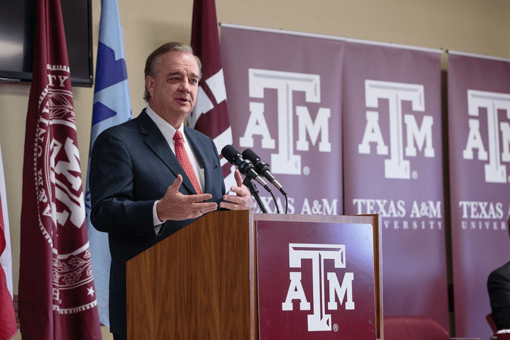 John Sharp speaking at a press conference