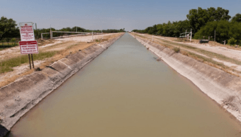 a canal with murky water