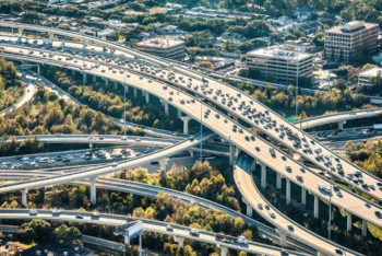 A grouping of freeways layered and curving in downtown Houston