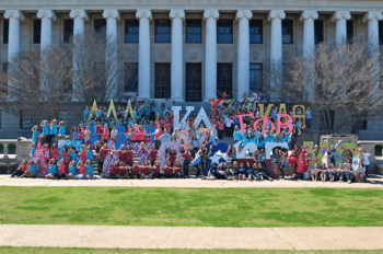 Texas A&M sororities pose before the Jack K. Williams building