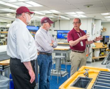 Young, Clement and Barteau aboard IODP ship for a tour
