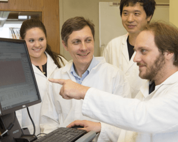 Dr. Ivan Rusyn (center) with students