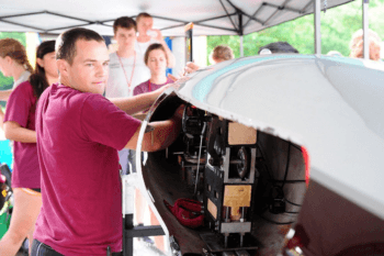 David Patterson of the submarine team “The 12th Mantaray” from Texas A & M University adjusts the dive planes prior to the teams time trials during the 13th International Human-Powered Submarine Race