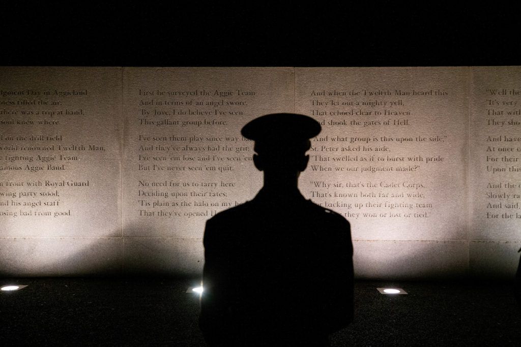 cadet silhoutted at the bonfire remembrance ceremony