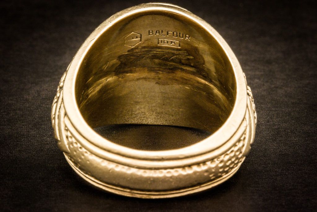 A photo of interior of the '83 Aggie Ring with the owner's name scratched out