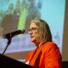 Texas A&M Provost & Executive Vice President Carol Fierke addressing the audience at a podium.