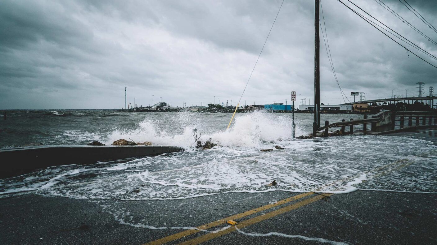 Water crashing over bridge during Hurricane Harvey in Kemah Texas