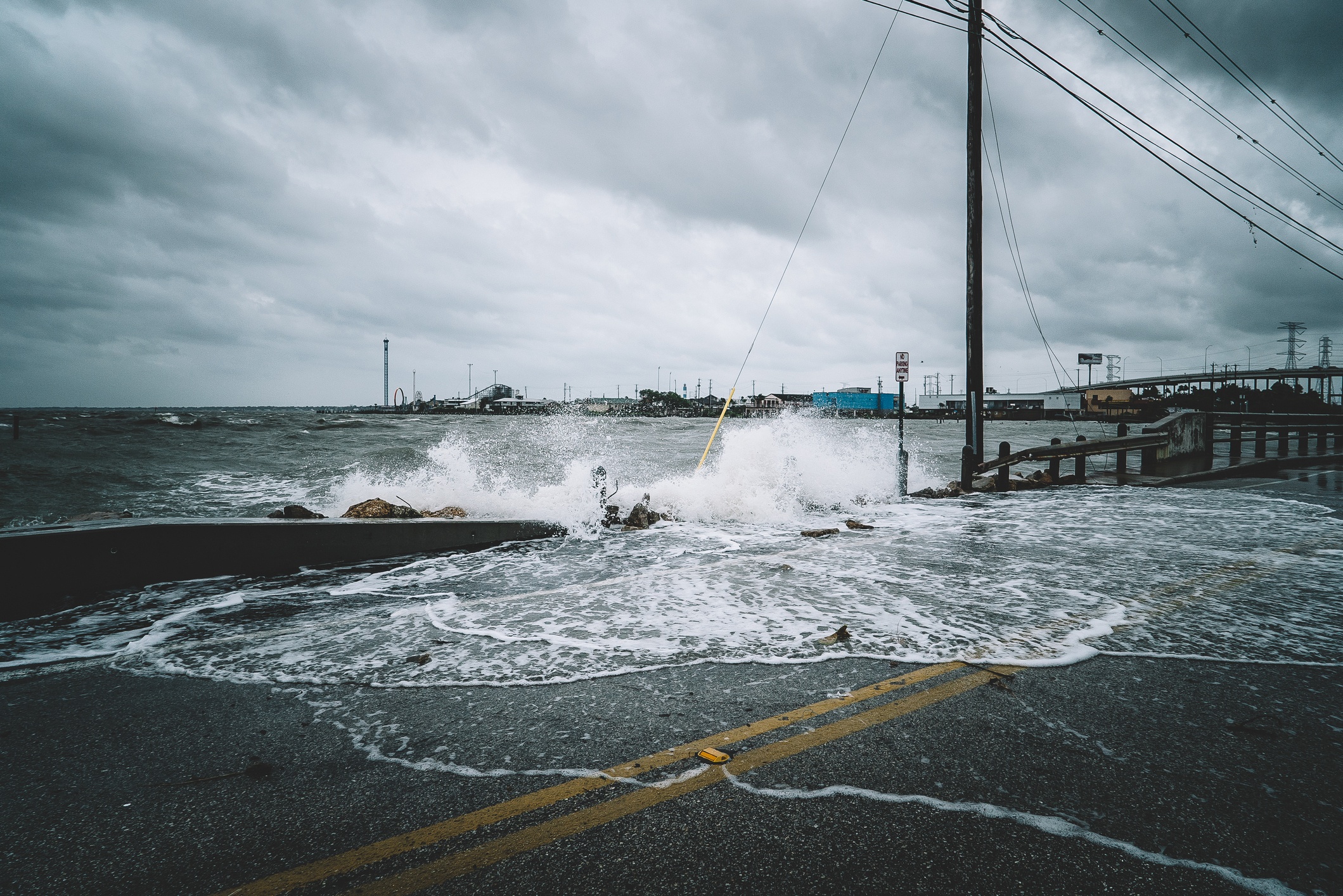 Water crashing over bridge during Hurricane Harvey in Kemah Texas