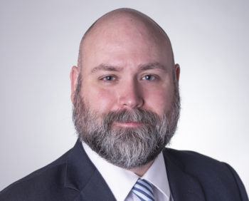 a headshot of Shawn Gibbs