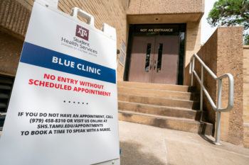exit of the a.p. beutel healh clinic with a sign indicating no entrance without appointment