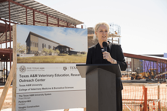 dean eleanor green standing outside at a construction site