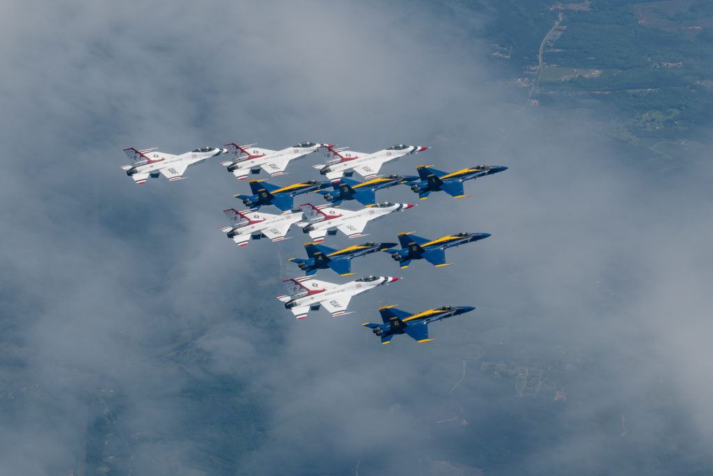 view from above of planes flying in formation