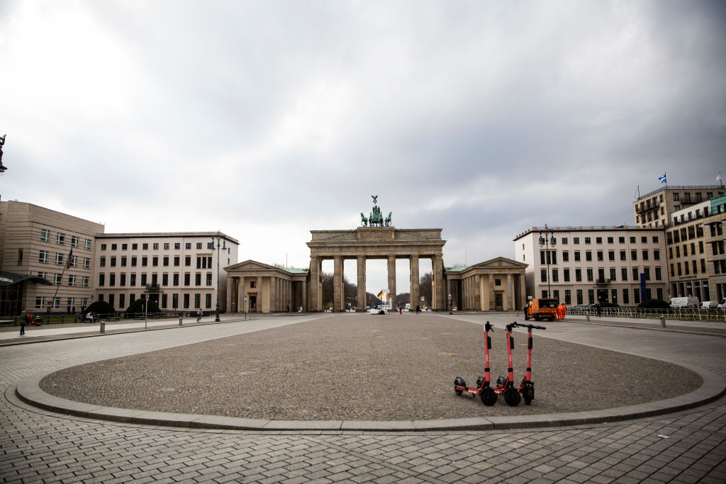 almost empty pariser platz by the brandenburg gate in berlin, germany