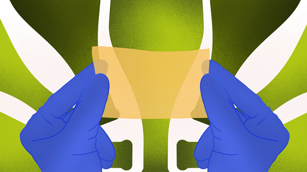 illustration of gloved hands holding piece of material