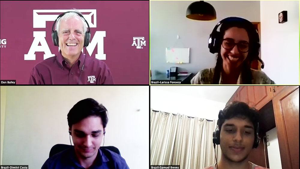 screenshot of four Zoom screens arranged in a square - in one corner is a professor and in the other three are students
