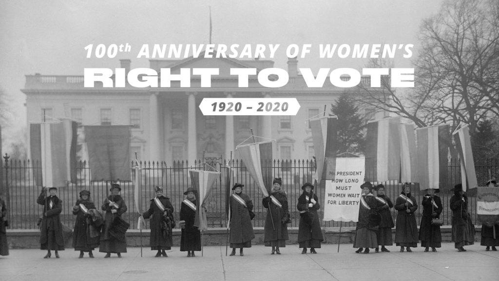 a photograph of suffragettes picketing in front of the White House
