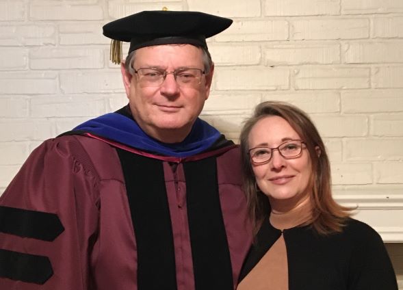 William "Dale" Weeks in his graduation robe with his wife Merritt