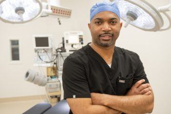portrait of dan burch in scrubs in dental exam room
