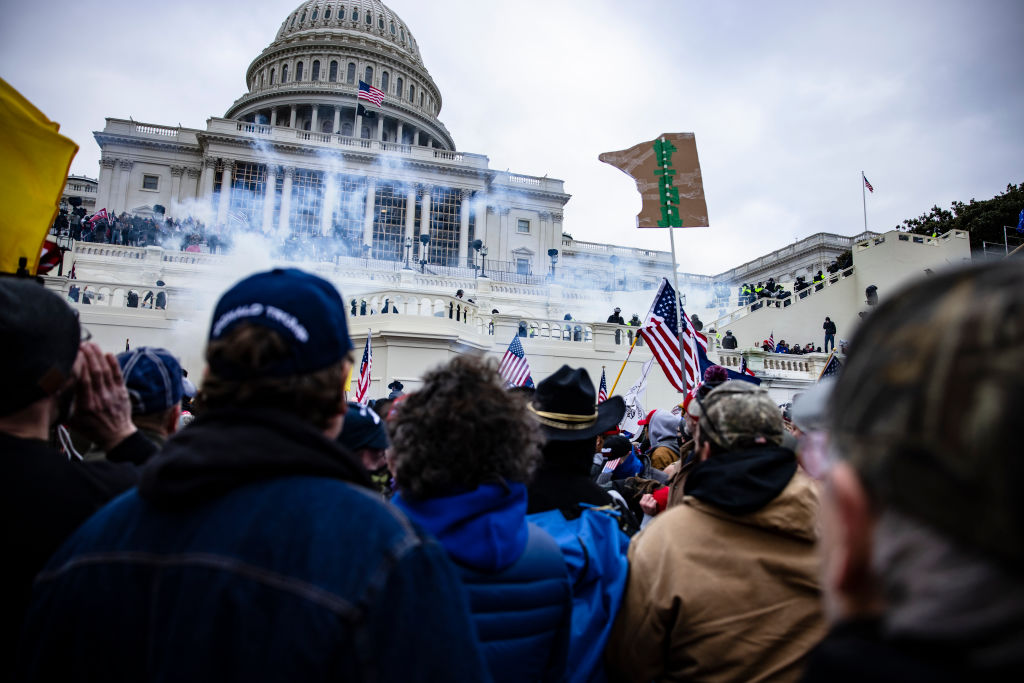 crowd of trump supporters gathered in fron of the capitol building