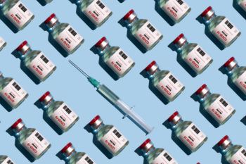 repeated vials and syringes against blue background