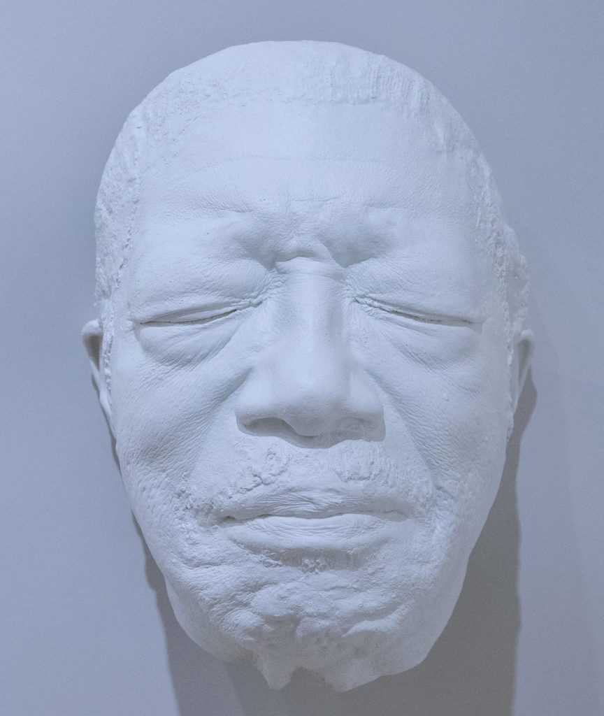 a cast mask of Bo Diddley