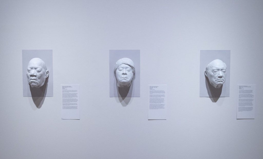 The cast resin face of blues musicians (L-r) Bobby Blue Bland, Ruth Brown and Robert Lee