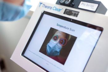 image of a woman's face in kiosk screen
