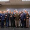 University and System officials pose with Gen. Milley