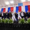 the stage party at commissioning sawin' em off