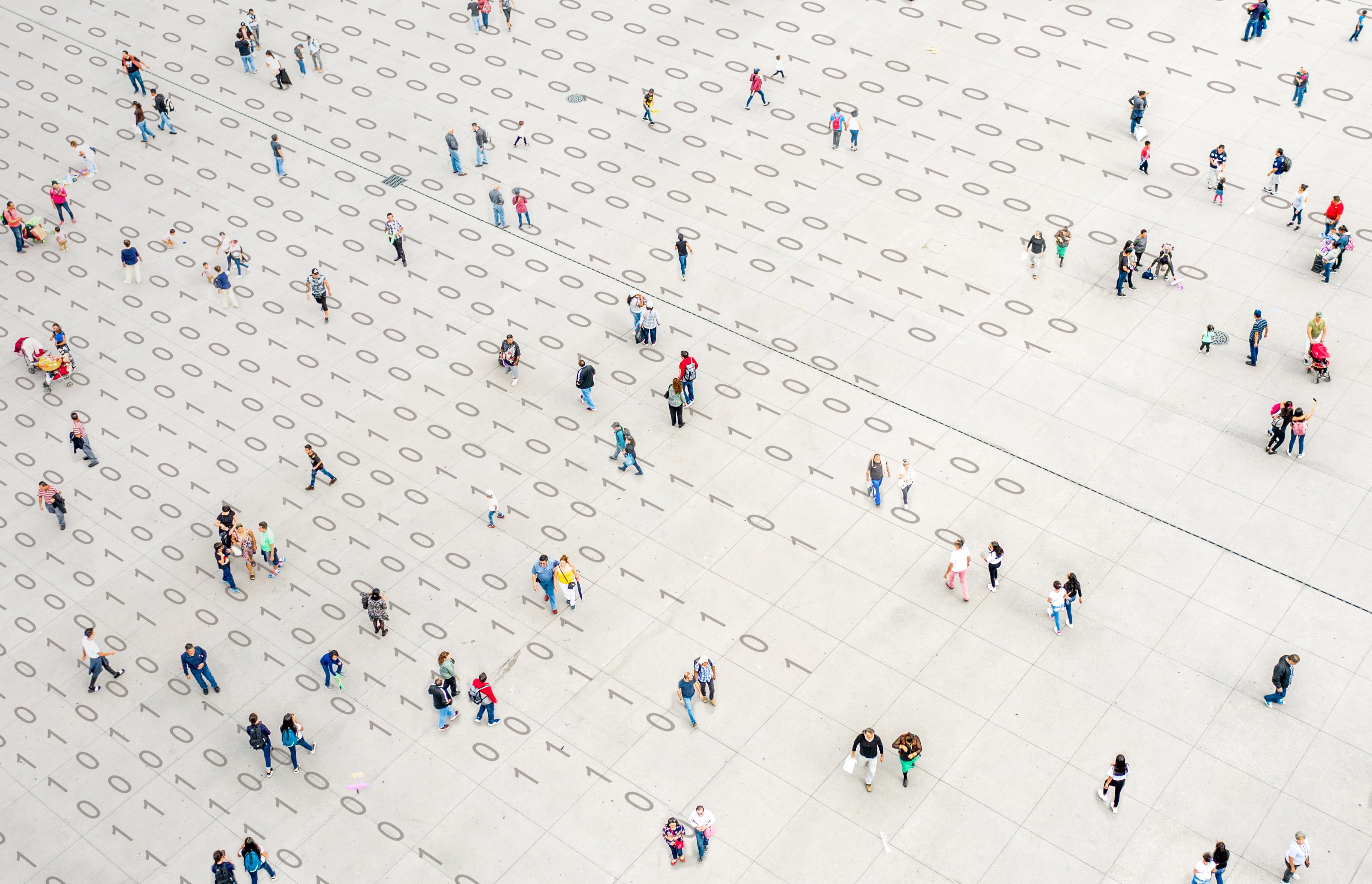 overhead artist's rendering of a crowd of people walking over binary code