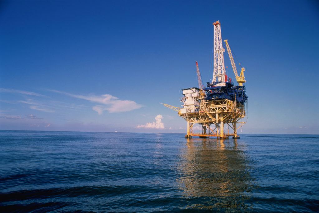 oil rig in the middle of the ocean