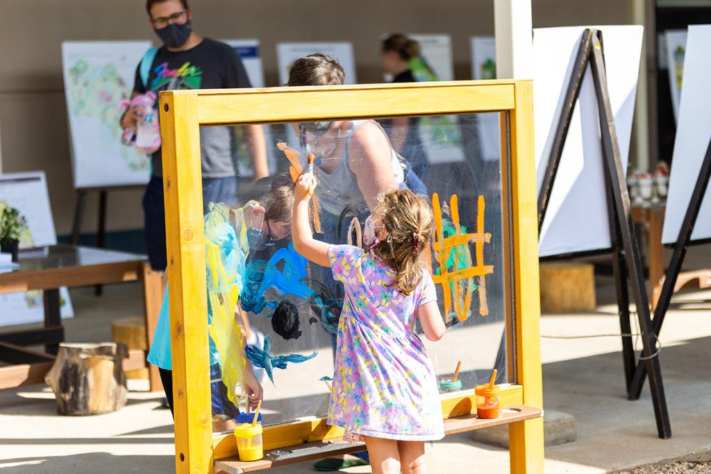 a photo of a girl painting