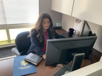 female student sitting at a desk