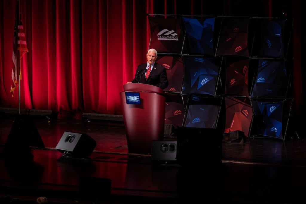 mike pence speaking on a stage