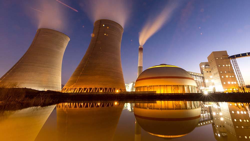 exterior of a nuclear plant at night