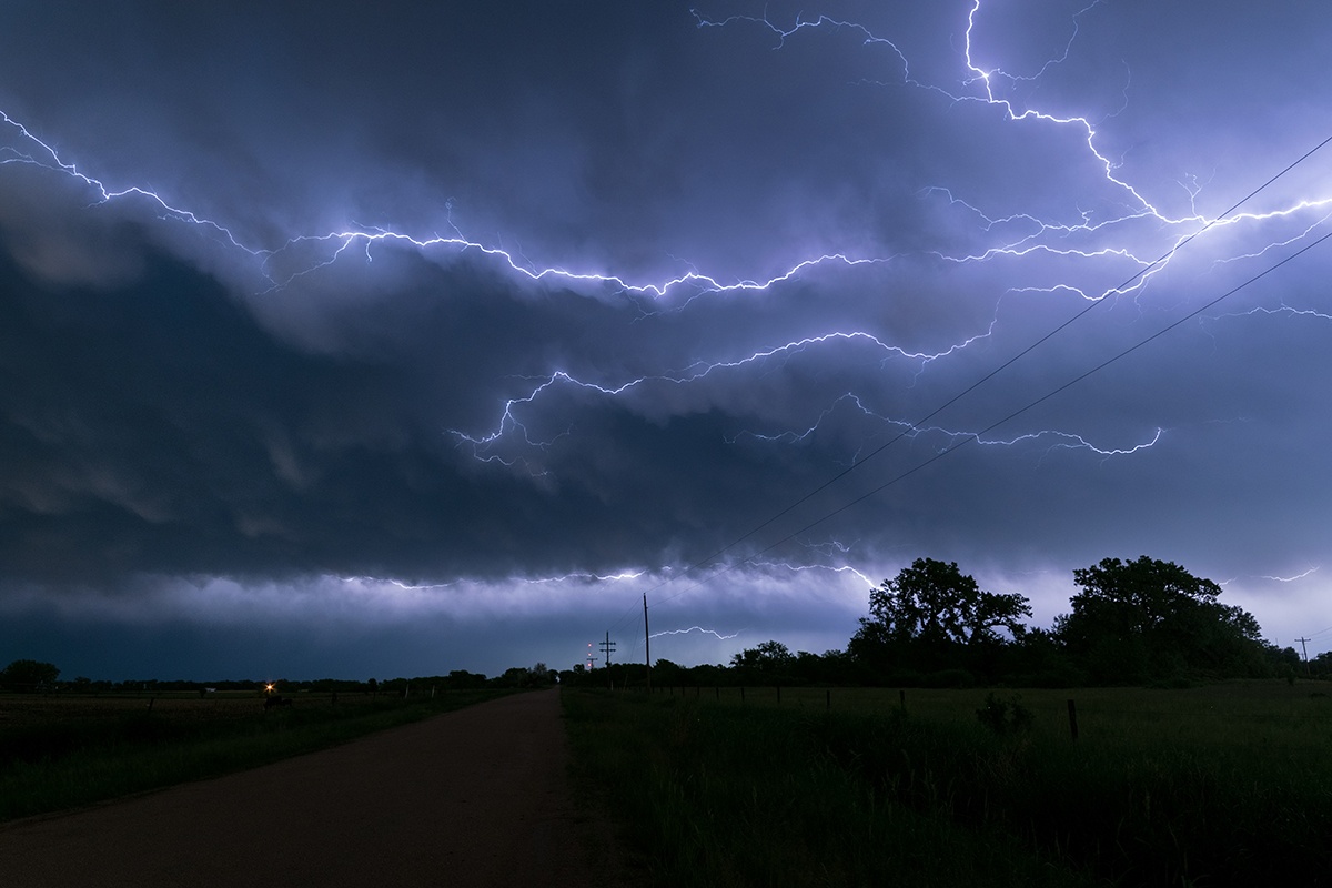 a flash of lightning moving horizontally across the sky