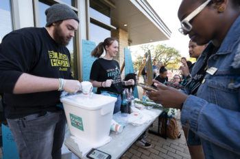 Wesley Hillis '24 working a booth at Take Back the Night