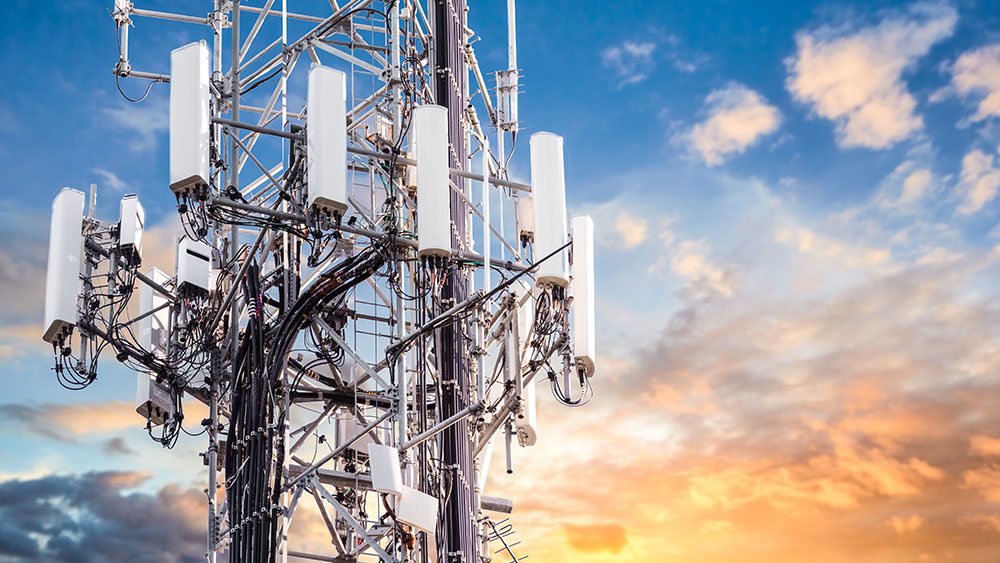 cellular tower against a sunset