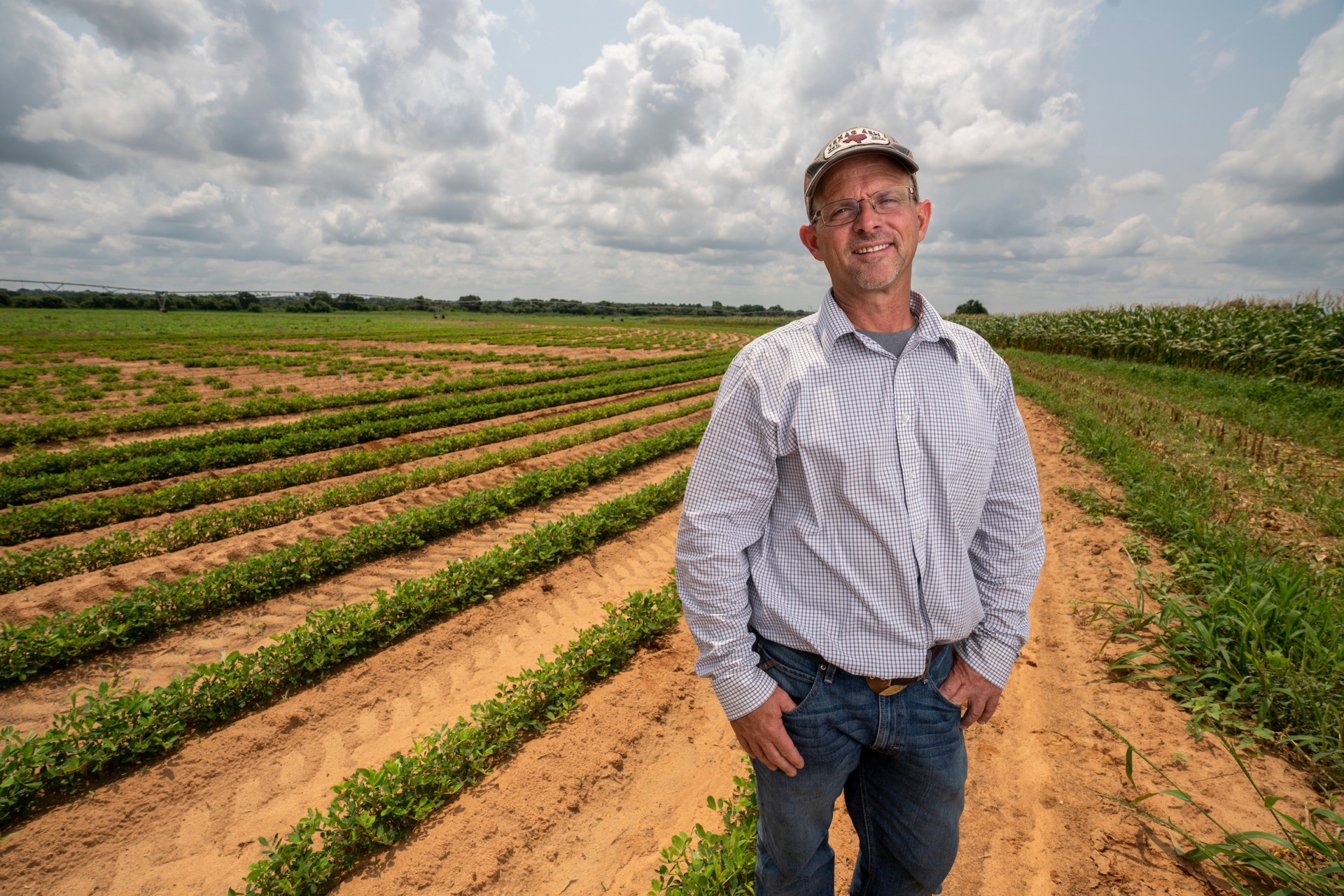 A man standing in a field in Stephenville, TX