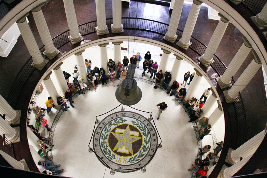 visitors to the rotunda viewing the Liberty Bell replica