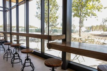 a photo of a long wooden counter in the Aggie Park creamery