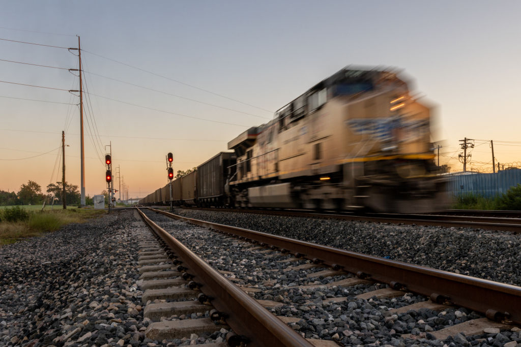 Blurred image of a train moving on a railroad track
